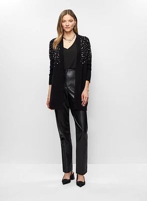 Cardigan en tricot et pantalon en faux cuir