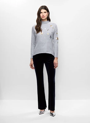 Pull à étoiles et pantalon en velours