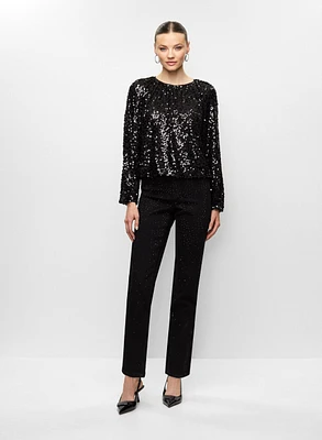 Haut en sequins et jean droit