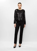 Haut en sequins et jean droit