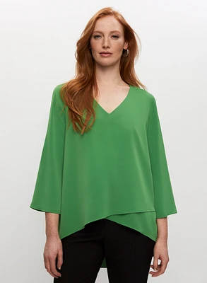 Haut asymétrique à effet superposé