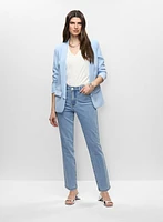 Veste mi-longue et jean droit