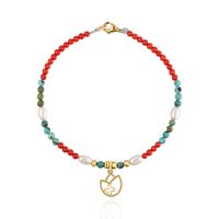 Pulsera Tulipan Dorado / Coral, turquesa y perla