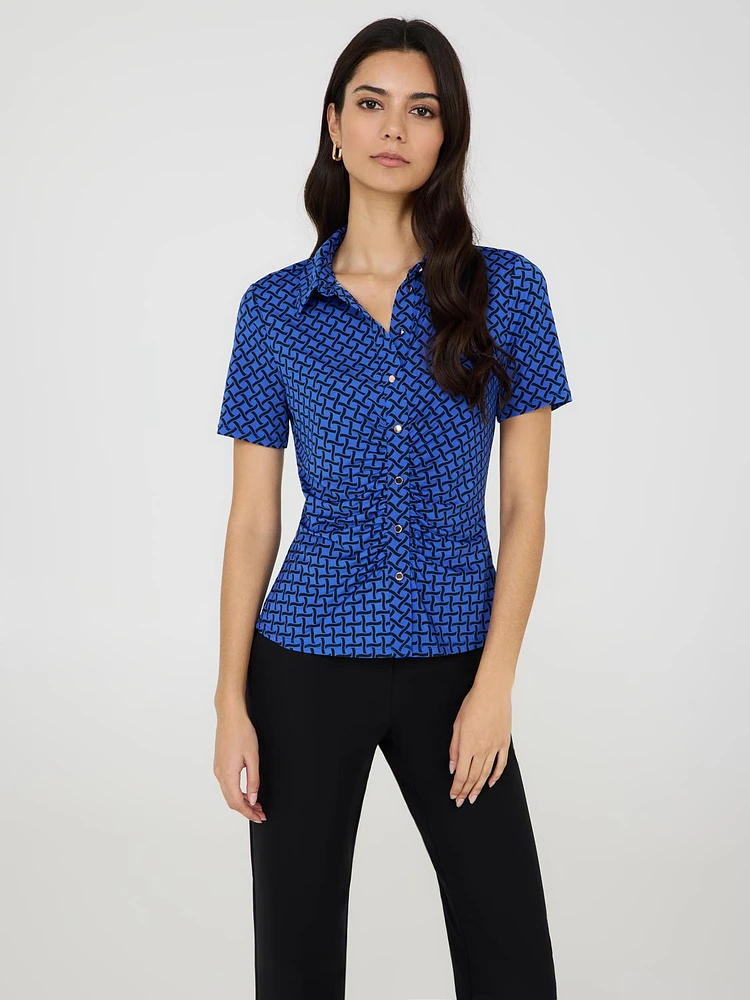 Blouse à imprimé abstrait avec plis et boutons sur le devant