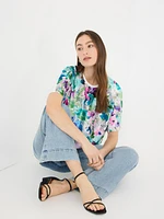 T-shirt en satin à manches dolman et imprimé floral sur le devant