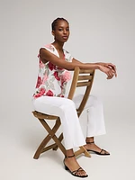Blouse boutonnée sans manches à volants et motif fleuri