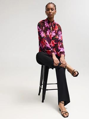 Blouse en mousseline à col noué et imprimé floral
