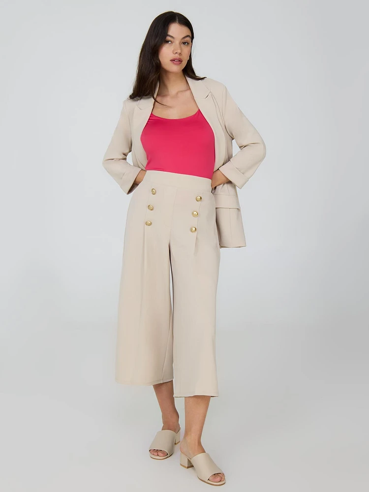 Pantalon gaucho à jambes larges et détails boutonnés