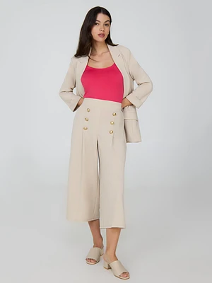 Pantalon gaucho à jambes larges et détails boutonnés