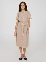 Robe mi-longue en mousseline à col fendu et motif pois