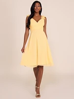 Robe en mousseline ajustée et évasée à col V