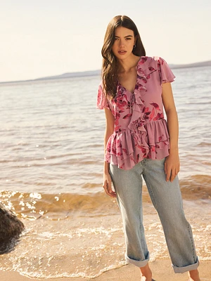 Blouse à manches flottantes et noeud sur le devant