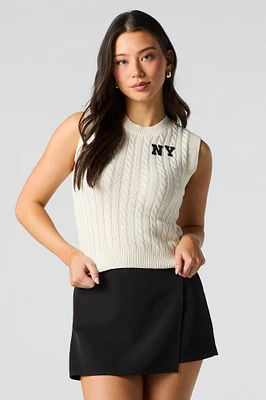 Veste en tricot torsadé avec motif brod