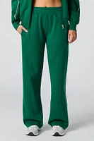 Pantalon d'entraînement Active en molleton avec motif brodé LA