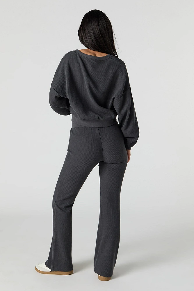 Pantalon en molleton tricot gaufré à jambe évasée