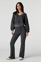 Pantalon en molleton tricot gaufré à jambe évasée