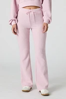 Pantalon en molleton tricot gaufré à jambe évasée