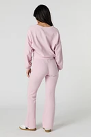 Pantalon en molleton tricot gaufré à jambe évasée