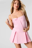 Combi-short plissé avec attache et ourlet de dentelle