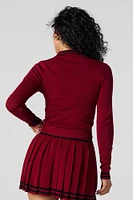 Haut court à manches longues en tricot contrastant