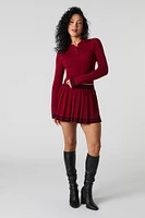 Haut court à manches longues en tricot contrastant