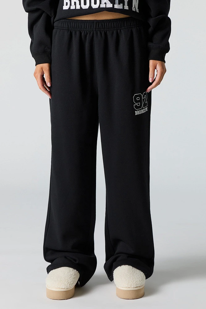 Pantalon d'entraînement à jambe large en molleton avec motif