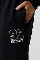 Pantalon d'entraînement à jambe large en molleton avec motif