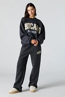 Pantalon d'entraînement à jambe large en molleton avec motif