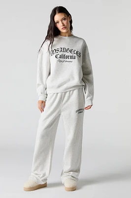 Pantalon d'entraînement à jambe large en molleton avec motif