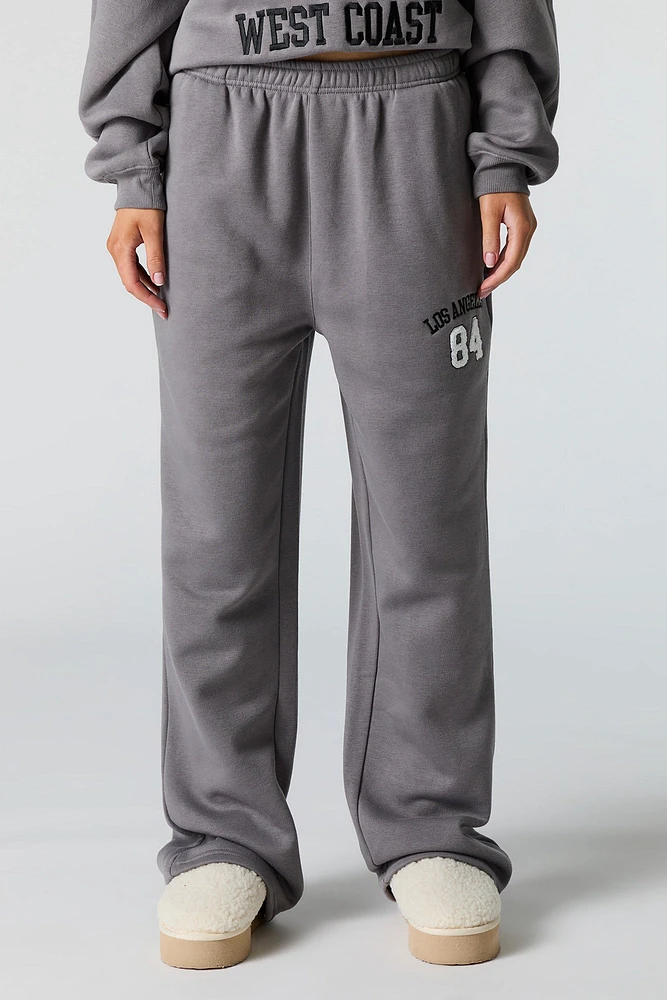 Pantalon d'entraînement à jambe large en molleton avec motif