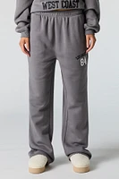 Pantalon d'entraînement à jambe large en molleton avec motif