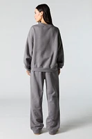 Pantalon d'entraînement à jambe large en molleton avec motif