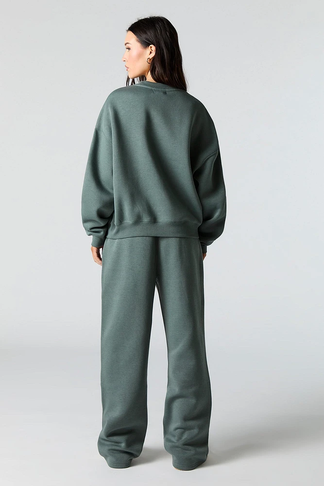Pantalon d'entraînement à jambe large en molleton avec motif