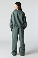 Pantalon d'entraînement à jambe large en molleton avec motif