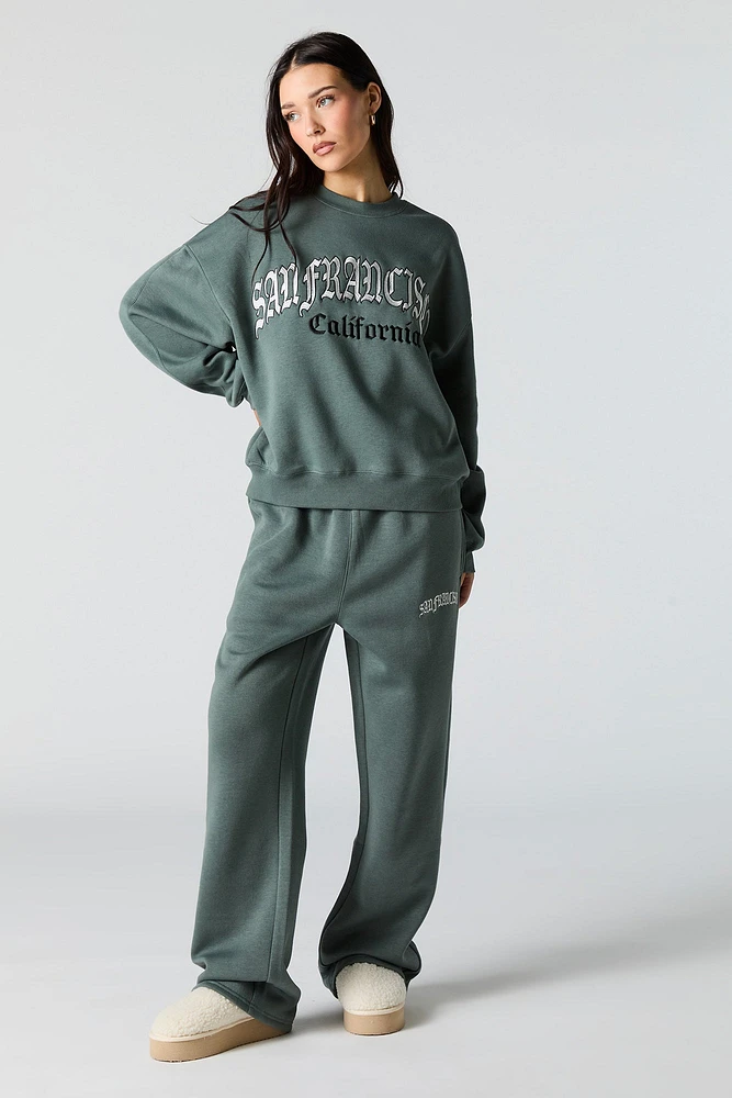 Pantalon d'entraînement à jambe large en molleton avec motif