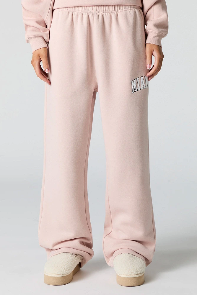 Pantalon d'entraînement à jambe large en molleton avec motif