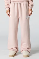 Pantalon d'entraînement à jambe large en molleton avec motif