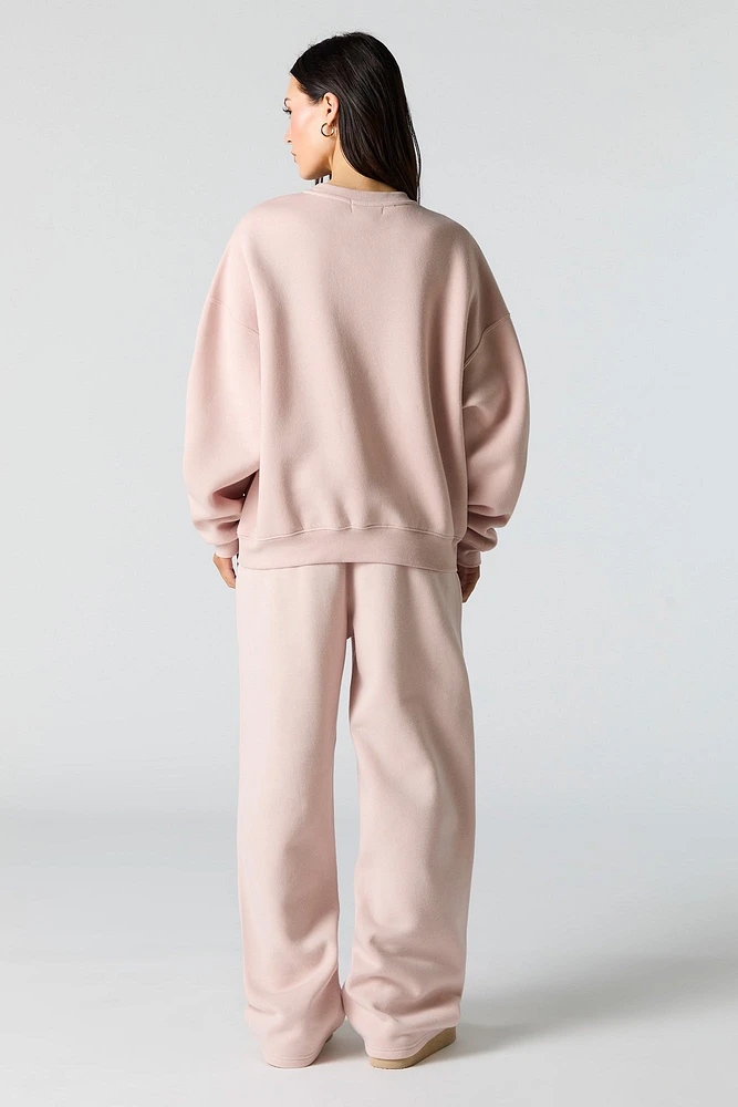 Pantalon d'entraînement à jambe large en molleton avec motif