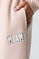 Pantalon d'entraînement à jambe large en molleton avec motif