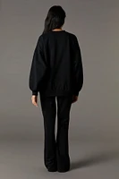 Pantalon en molleton jambe évasée à imprimé Playboy