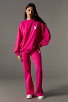 Pantalon en molleton jambe évasée à imprimé Playboy