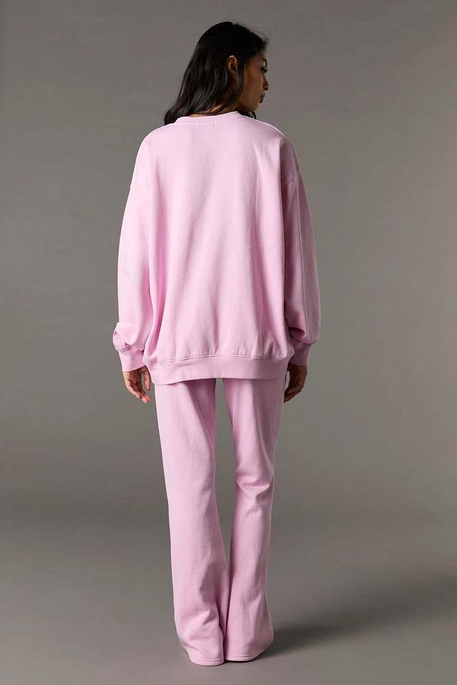 Pantalon en molleton jambe évasée à imprimé Playboy