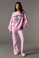 Pantalon en molleton jambe évasée à imprimé Playboy