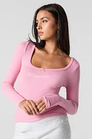 Haut à encolure ronde avec manches longues et broderie