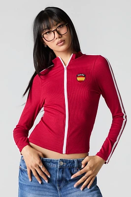 Haut sport côtelé avec motif brodé et fermeture à glissière