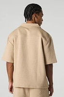Polo boutonné textur
