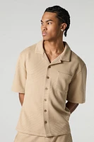 Polo boutonné textur