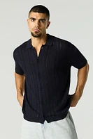 Haut en tricot ouvert boutonné à motif