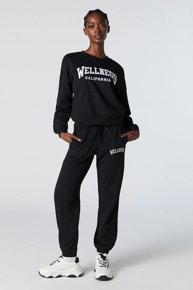 Jogger en molleton avec motif brodé destination
