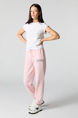 Jogger en molleton avec motif brodé destination